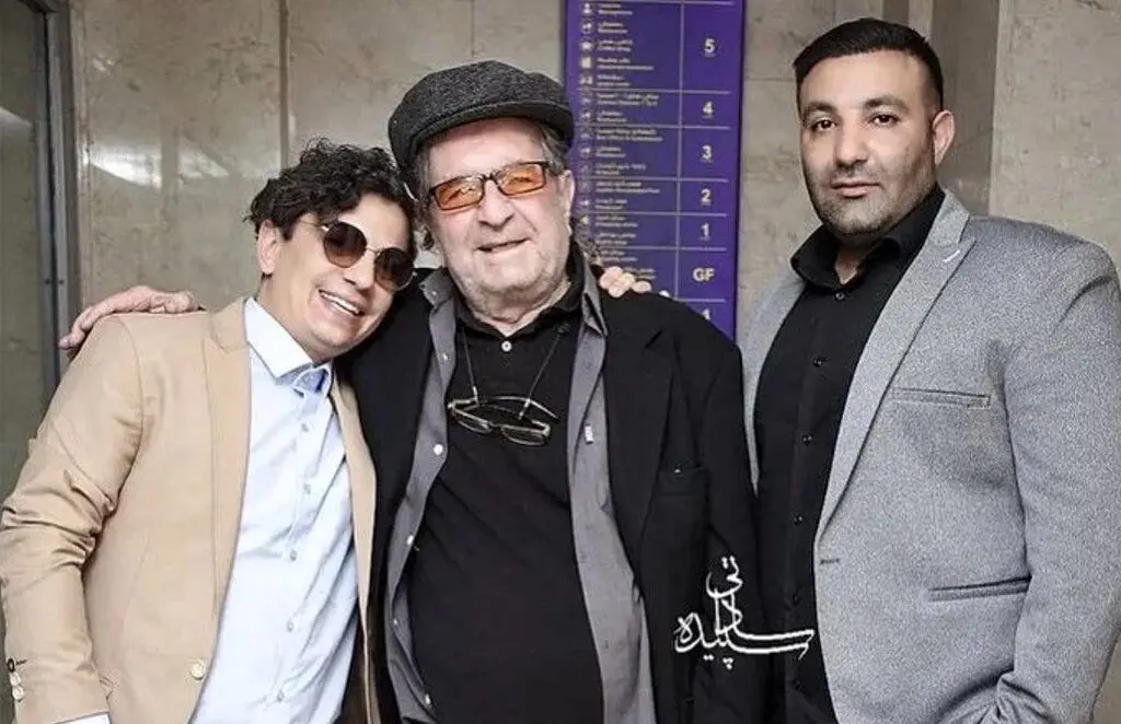 ببینید | وقتی داریوش مهرجویی به شانه های یک خواننده پاپ تکیه می زند