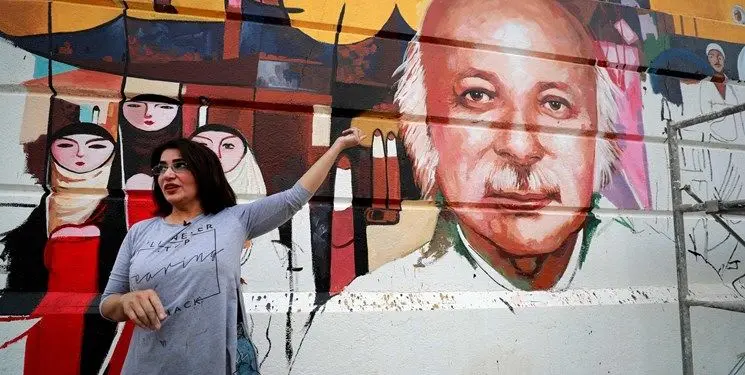 هنرنمایی زن عراقی در خیابان‌های بغداد + تصاویر