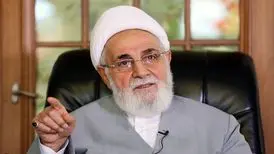 عکس | حضور ناطق نوری بر سر مزار محمدرضا شجریان