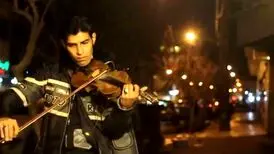 غرش پدافند و نوازنده ویولن در تهران/ویدیو
