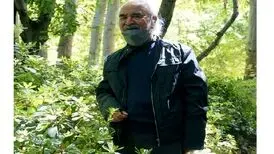شفیعی کدکنی در کنار مزار استاد آواز ایران/ عکس