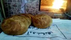 (تصویر) پخت سوغات جنگ جهانی دوم در کوچه آلمانی‌های قائمشهر