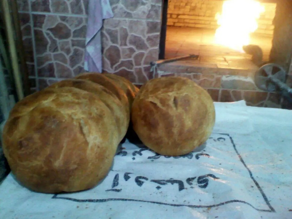 (تصویر) پخت سوغات جنگ جهانی دوم در کوچه آلمانی‌های قائمشهر