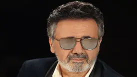  واکنش وزیر ارشاد به سوالی درباره بازگشت معین به ایران
