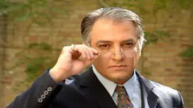 تصویری از ایرج نوذری به همراه دو دخترش