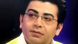 عکس از نوجوانی فرزاد حسنی روی جلد یک روزنامه
