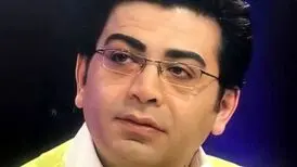 عکس از نوجوانی فرزاد حسنی روی جلد یک روزنامه
