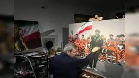 علی میرفتاح نقاشی خود را تقدیم به پاکبان شهید کرد
