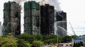 وداع در میان شعله‌ها/بهترین عکس مطبوعاتی در 2026