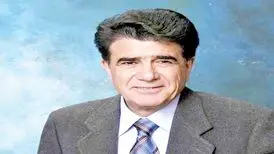 تصویری دیده نشده از محمدرضا شجریان در آغوش پدر در سال ۱۳۱۹
